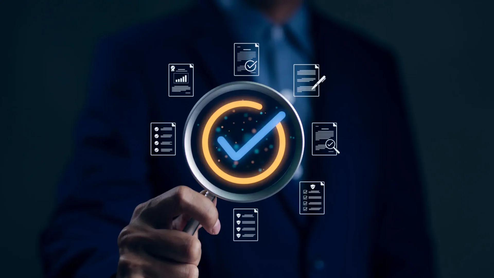 Businessman holding magnifying glass with check mark.
